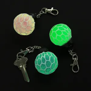 Fun Express Glow-in-the-Dark Mesh-Covered Squeeze Ball Backpack Clips – Fun & Stress-Relieving Party Favors Accessories for Kids School Supplies & Gifts – Perfect for Backpacks & Keychains – 12 Pieces