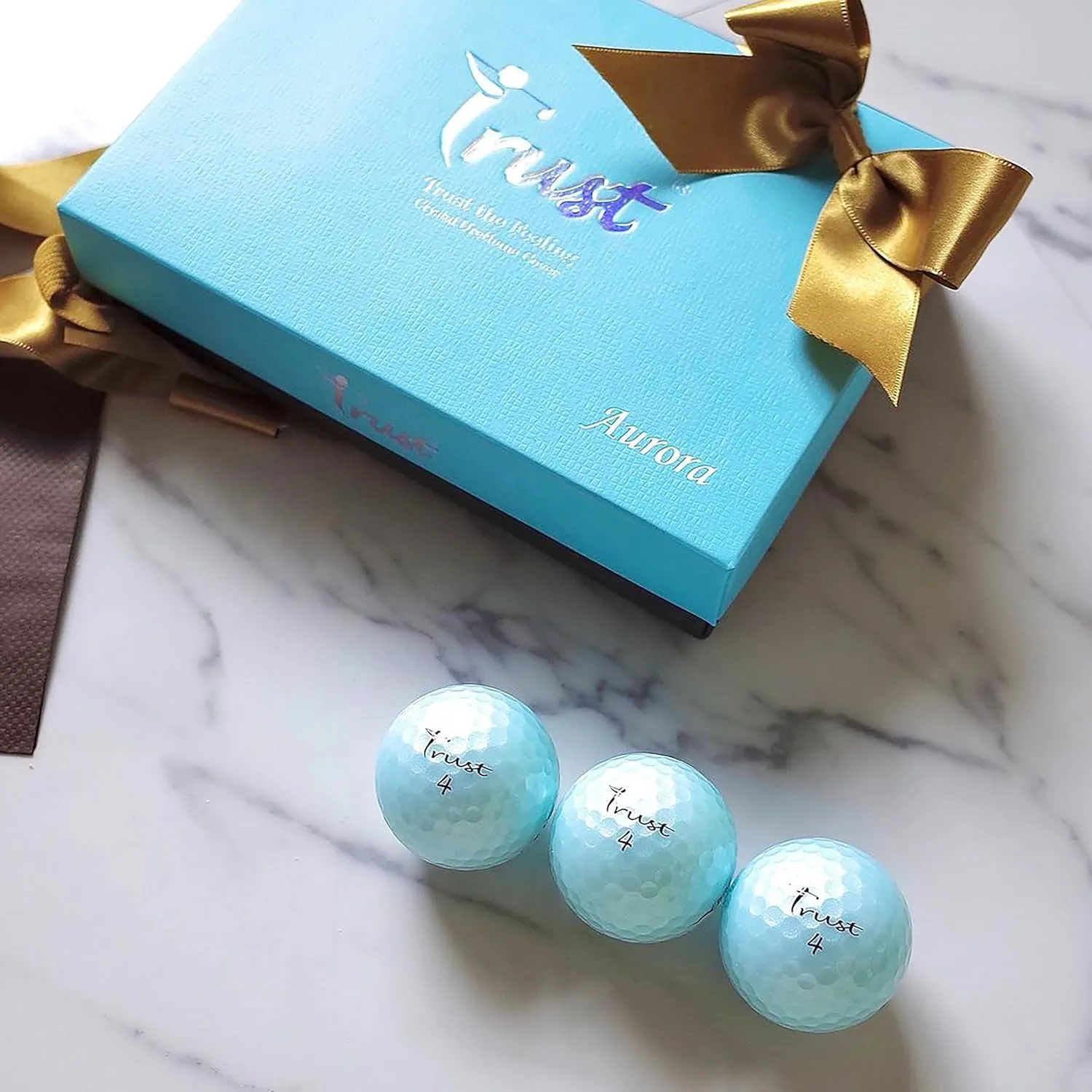 Trust Golf Balls - Aurora & Rosa Crystal Urethane Series | Eye-Catching & Easy to Spot | Maximum Distance, Soft Feel, Straight Flight, & Greenside Control | Blue, Orange, Pink, Yellow | 12 or 48 Balls